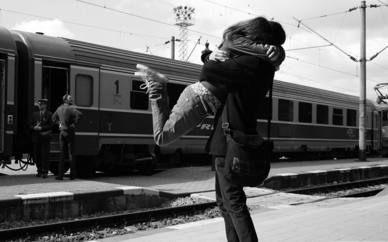 young-couple-at-the-train-station.jpg